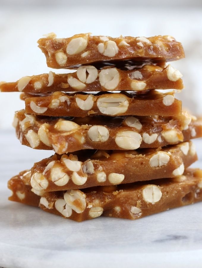 Mom's Old Fashioned Peanut Brittle stacked in a pile.