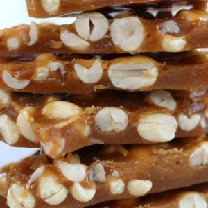 Up close photo of a stack of Peanut Candy.