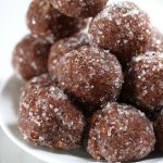 A pile of Chocolate Rum Balls rolled in sparkling sugar.