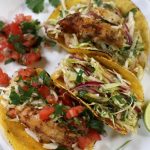 Three Baja Chicken Tacos on white plate.