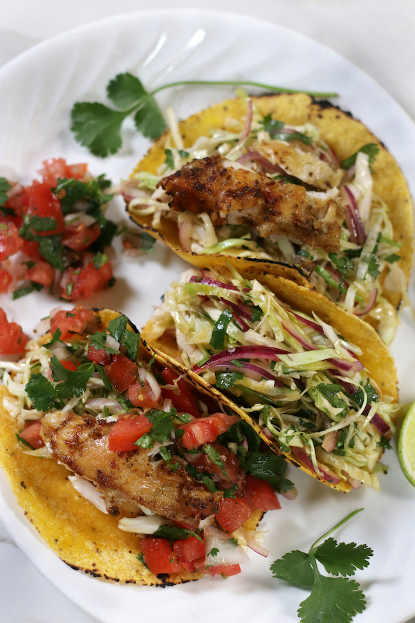 Overhead photo of Baja Tacos with chicken and Pico de Gallo.