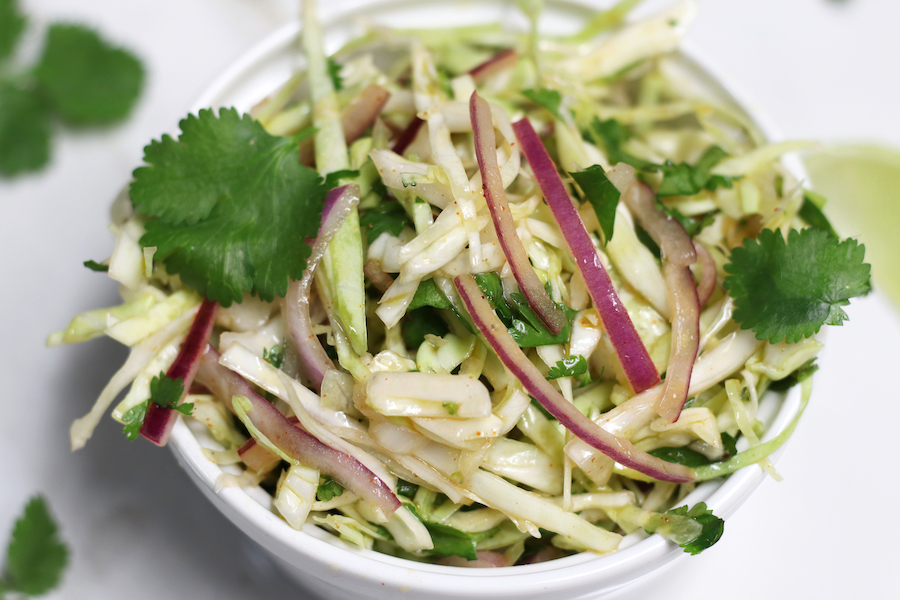 Overhead photo of a bowl of Cilantro Lime Coleslaw with no Mayo.