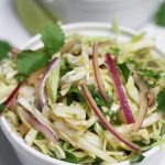 Up close photo of Mexican Coleslaw with Cilantro Lime Dressing.