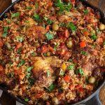 Overhead photo of Chicken and Chorizo Casserole in a cast iron frying pan.