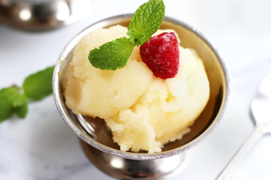 Up close photo of dairy free Frozen Lemon Dessert sitting on a white countertop.