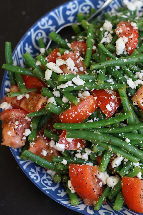 Green Bean Tomato Salad in a blue and white patterned bowl.