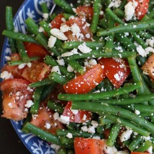 An up close photo of Green Bean and Tomato Salad.