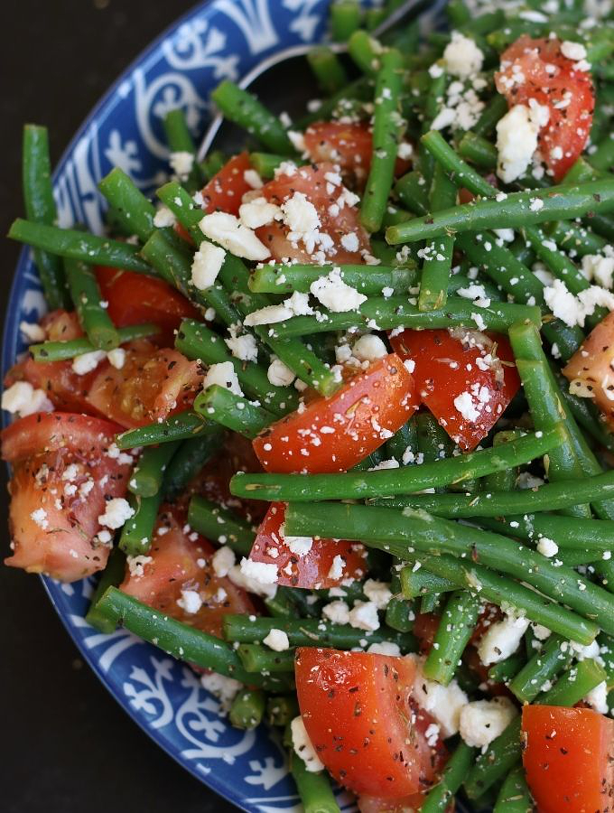 An up close photo of Green Bean and Tomato Salad.