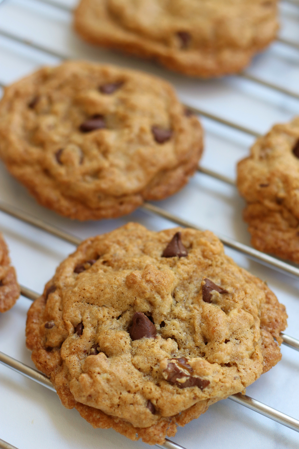 Vegan Chocolate Chip Cookies with Applesauce cooling on a rack.