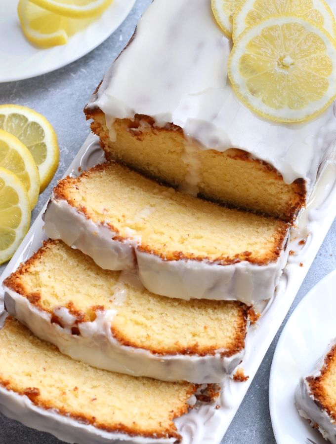 Slices of Italian Lemon Pound Cake on a white platter.