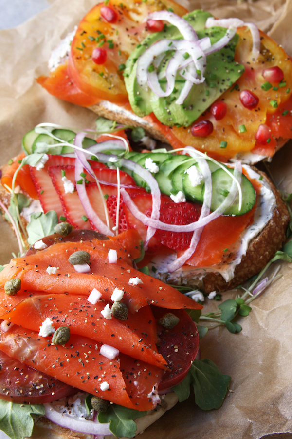 Overhead photo of three different Lox Sandwiches.