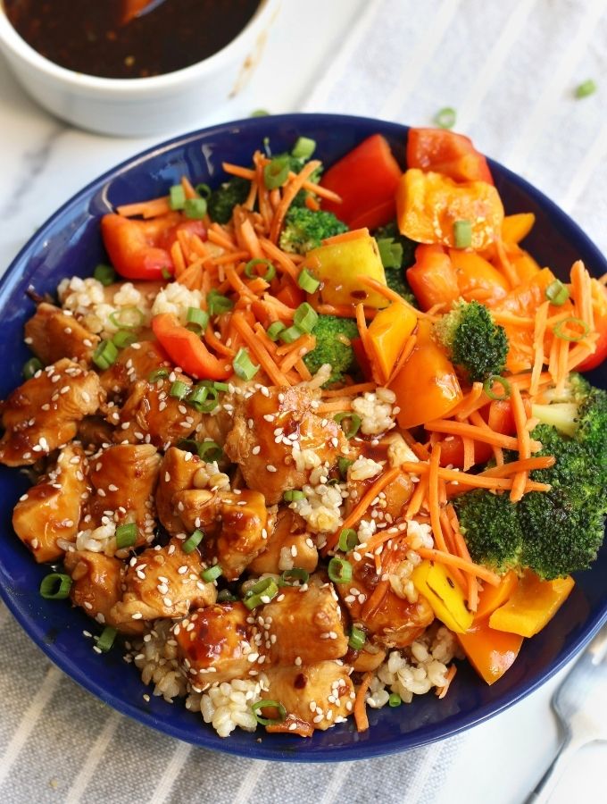 Overhead photo of Teriyaki Chicken Bowls recipe in a blue bowl.