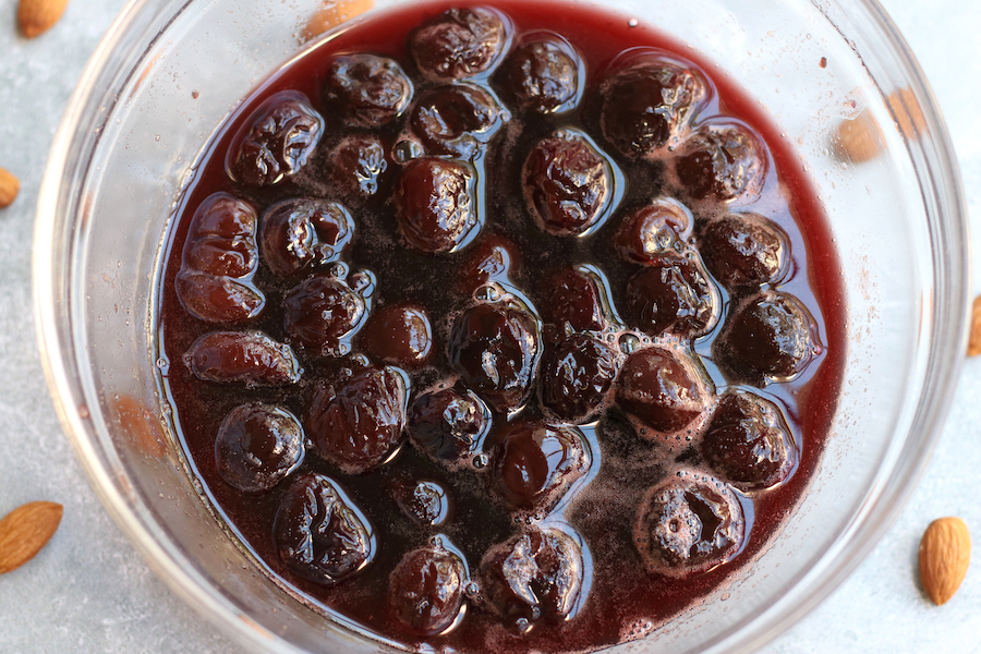 Overhead photo of a large bowl of Cherry Compote Recipe with Amaretto.
