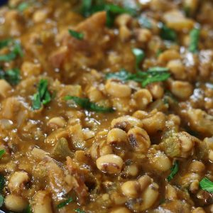 A serving of Black Eye Peas Soup Recipe in a blue bowl.