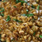 Up close photo of Black Eyed Pea Soup garnished with fresh parsley.