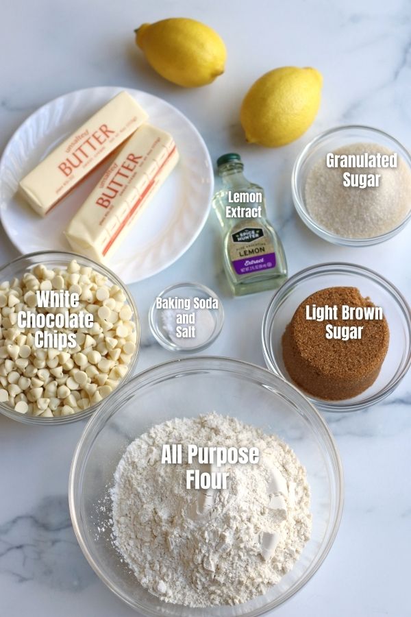 Ingredients for Lemon White Chocolate Cookies laying on a white countertop.