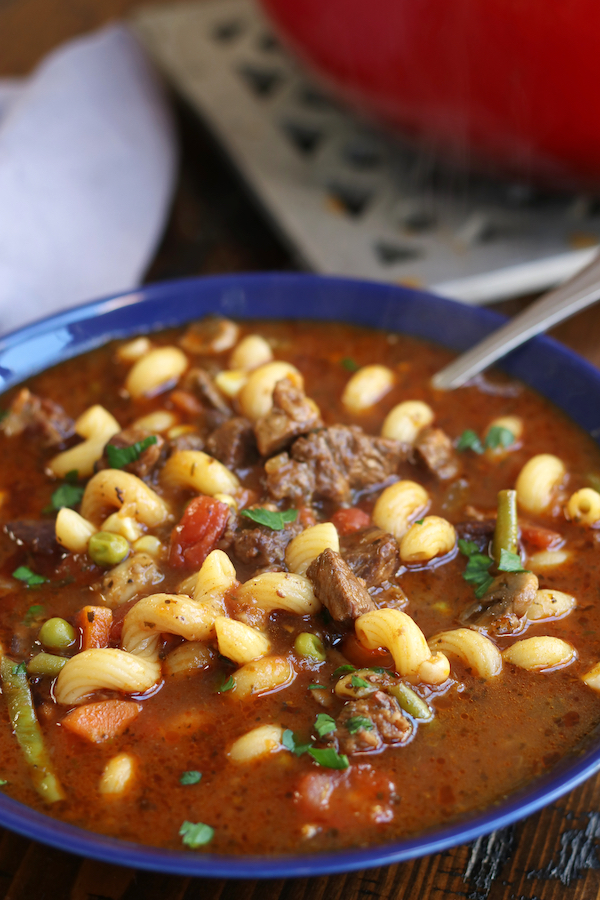 Beef Vegetable Soup Recipe served in a blue bowl.