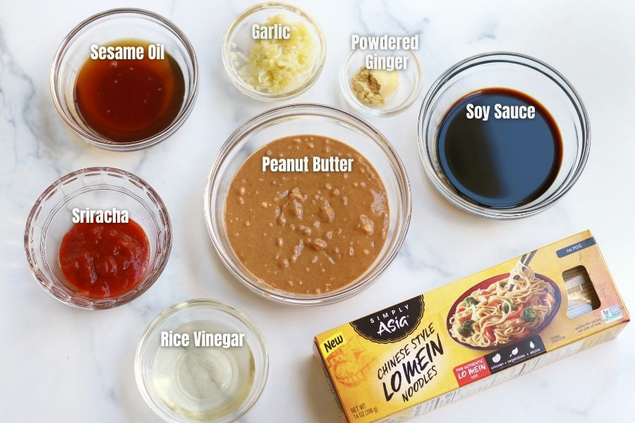 Ingredients for Easy Peanut Noodles measured into small glass bowls.