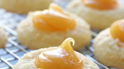 Up close photo of Lemon Curd Cookies on a cooling wrack.