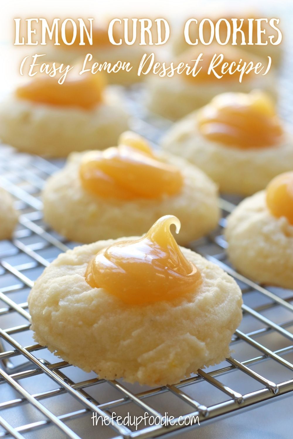 Lemon Curd Cookies have the base of a whipped lemon shortbread cookie that is filled with creamy lemon curd. These cookies are incredibly easy to make and are lusciously divine. Serve them as a special treat for lemon lovers or as a dessert for the holidays, baby showers, bridal showers or summer parties. 
#LemonCurdCookies #LemonCurdUses #WhatToDoWithLemonCurd #Best LemonDesserts #LemonTreats #LemonDesserts #LemonDessertRecipesEasy