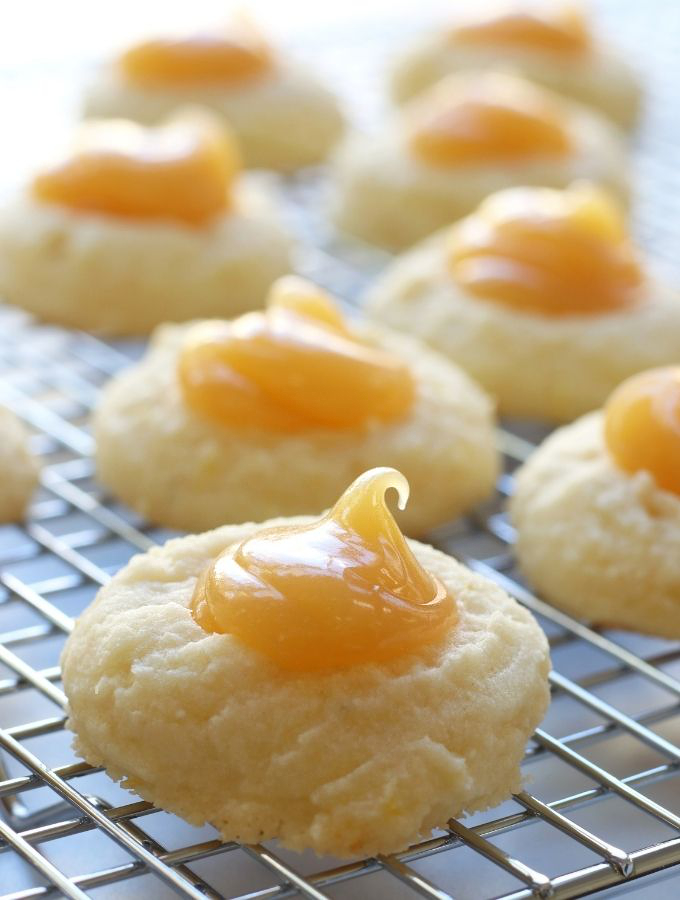 Up close photo of Lemon Curd Cookies on a cooling wrack.