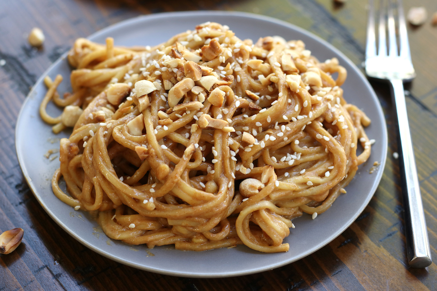 Overhead photo of Peanut Butter Pasta sitting on a wooden table.