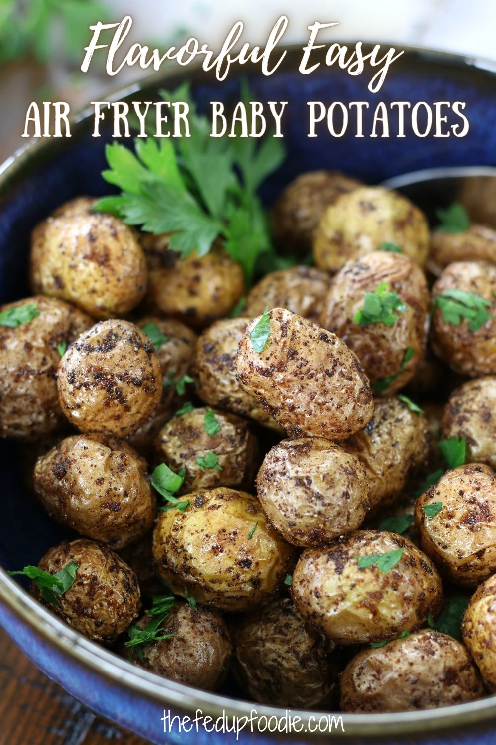 This Air Fryer Baby Potatoes recipe creates flavorful potatoes that are slightly crispy on the outside and tender on the inside. An incredibly easy side dish that is wonderful served with all kinds of main dishes. #AirFryerRecipes #AirFryerPotatoes #AirFryerBabyPotatoes #SmallPotatoesInAirFryer #LittlePotatoesInAirFryer