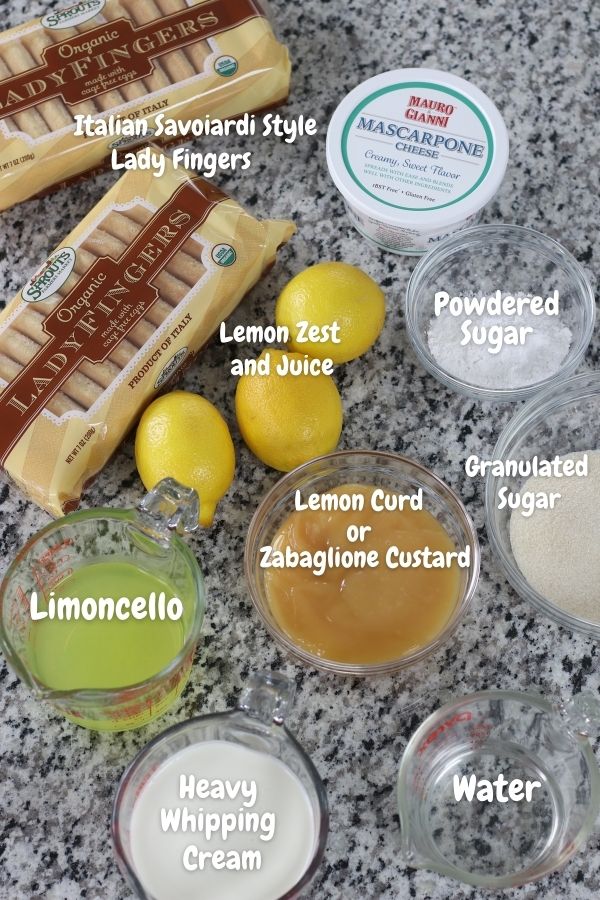 Ingredients for Limoncello Tiramisu laid out on grey granite countertop.