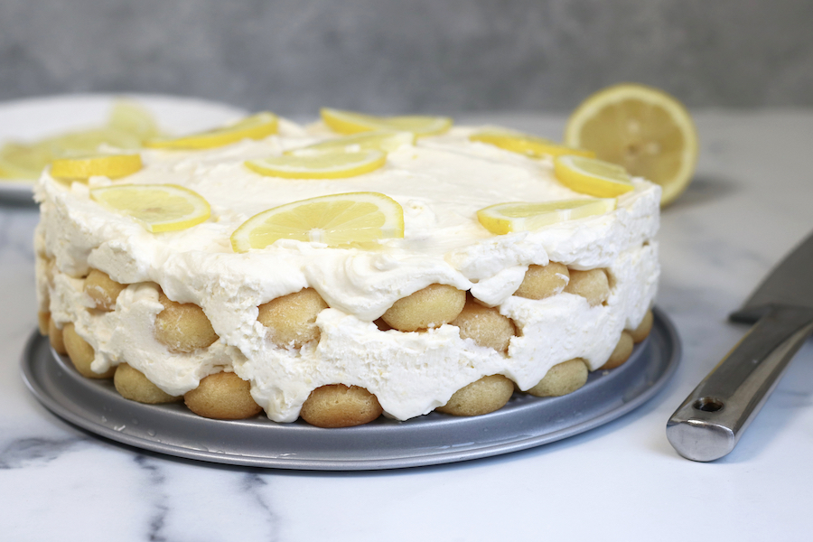 Lemon Curd Tiramisu sitting on a white marble countertop.