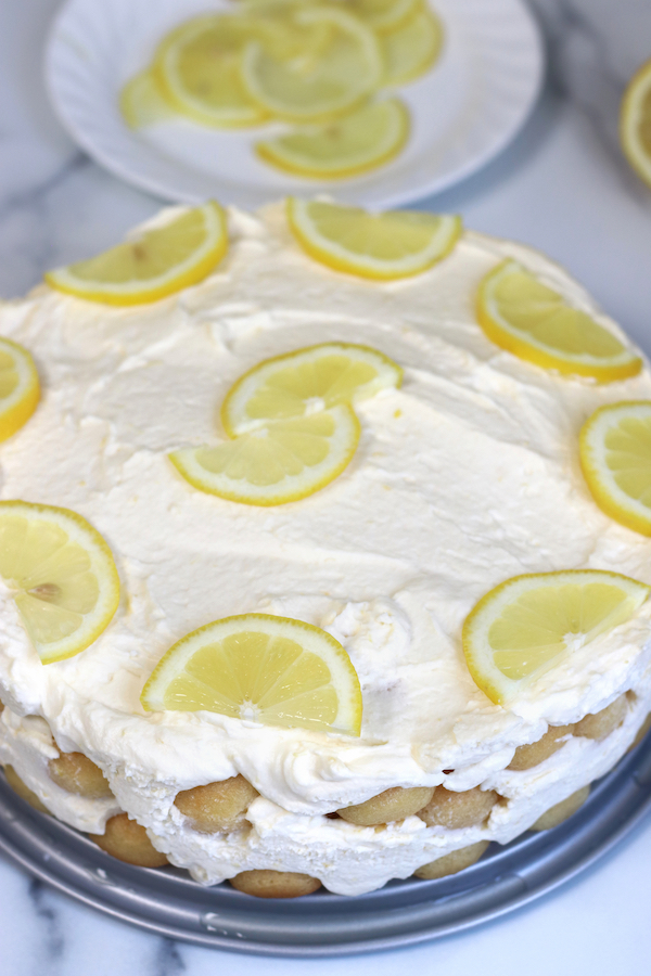 Lemoncello Tiramisu decorated with lemon slices.