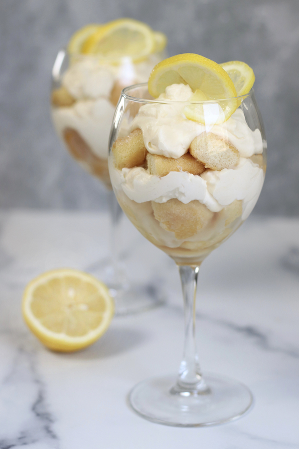 Limoncello Tiramisu served in two wine glasses.