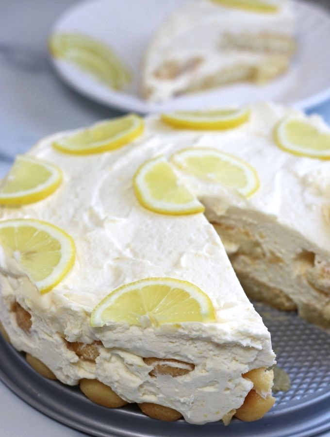 Limoncello Tiramisu with a slice taken out.