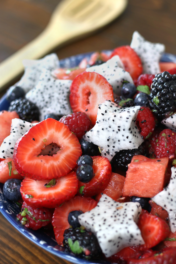 Summer Fruit Salad with strawberries, raspberries, blueberries, blackberries, watermelon and dragonfruit.
