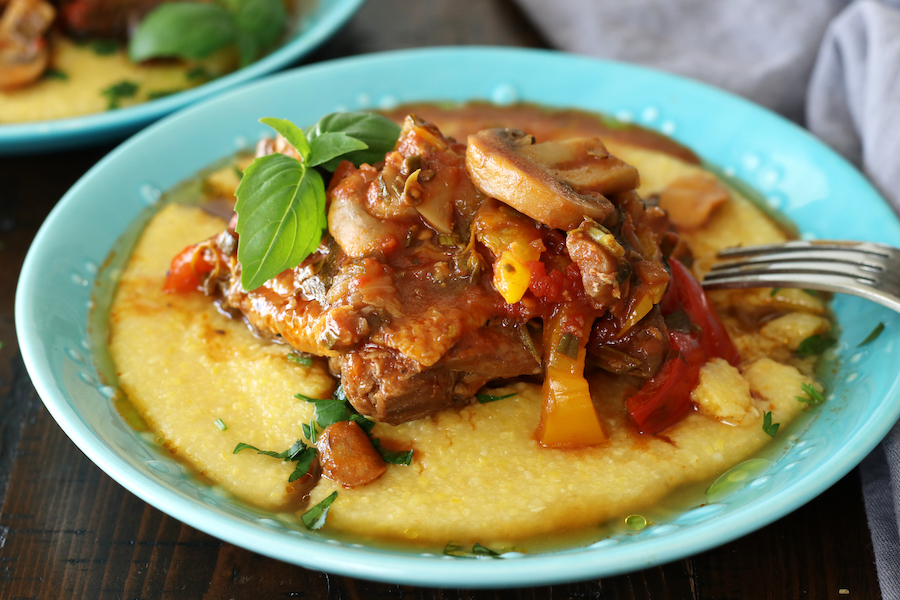 Best Chicken Cacciatore recipe served over creamy polenta.