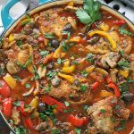 Overhead photo of prepared Chicken Cacciatore Recipe in a skillet pan.