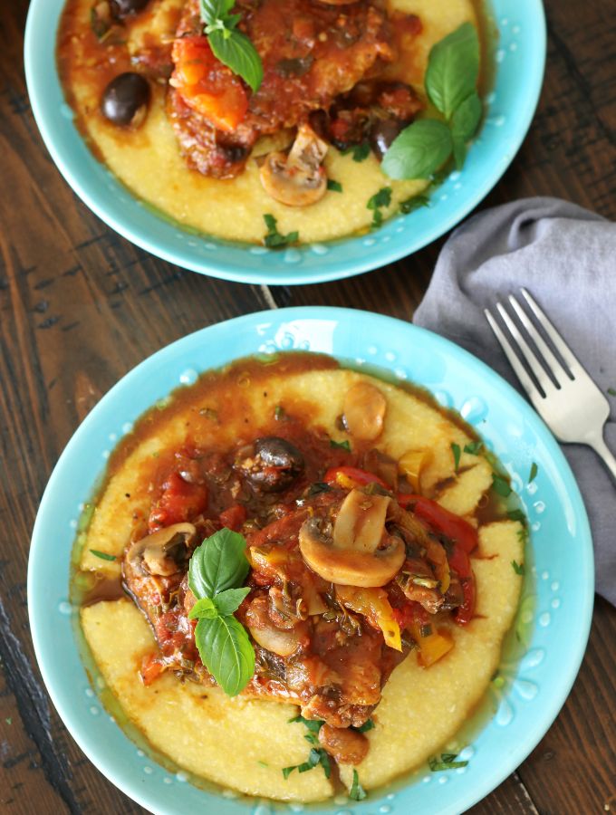 Two platted servings of Chicken Cacciatore.