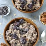 Overhead photo of Cherry Overnight Oats served in brown bowls.