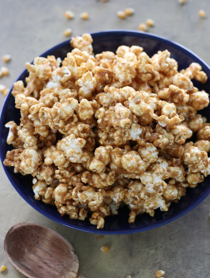 A big blue bowl of Peanut Butter Popcorn.