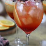 Cranberry Syrup Cocktails served in two wine glasses.