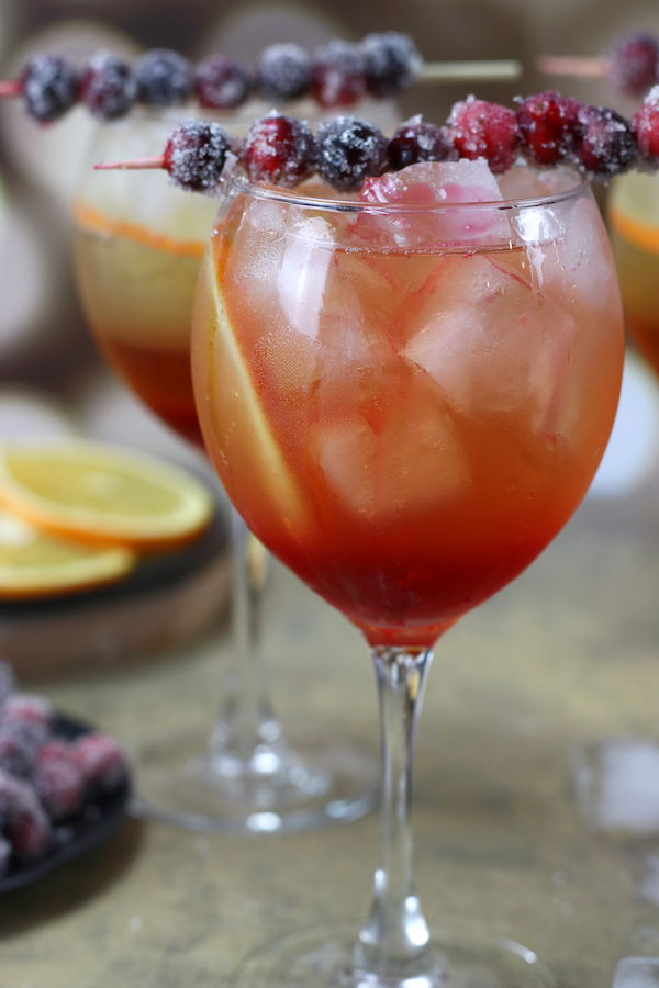 Cranberry Syrup Cocktails served in two wine glasses.