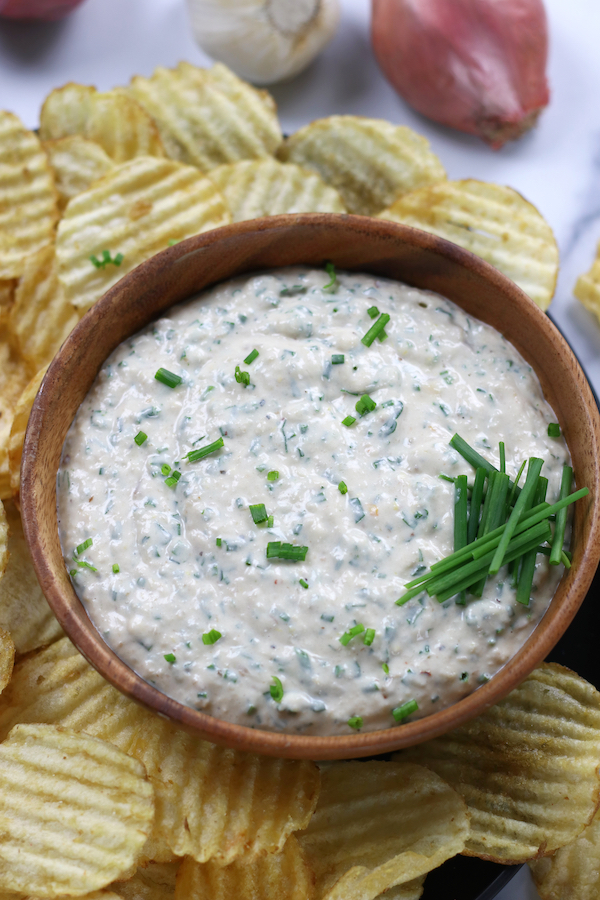 Overhead photo of Garlic Dip surrounded by wavy potato chips.