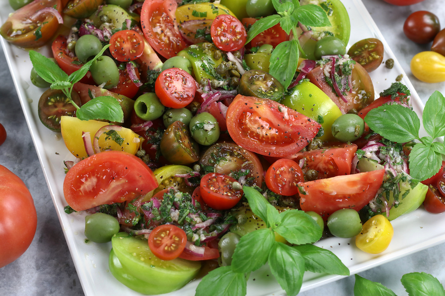 Heirloom Salad with green, yellow and read heirloom tomatoes.