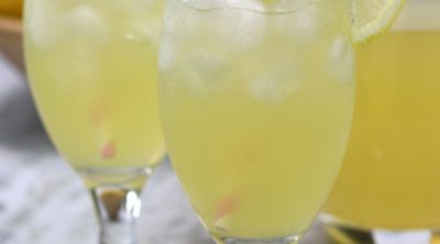 The Best Lemonade recipe poured into two glasses.