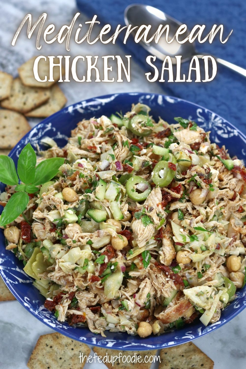 Mediterranean Chicken Salad Sandwich is a healthy and satisfying lighter lunch or dinner. Made with tender shredded chicken, chickpeas, refreshing cucumbers and tangy feta. Add in the simple olive oil red wine vinaigrette and you have symphony of Mediterranean flavors. #HealthyChickenSaladSandwich #NoMayoChickenSaladSandwich #ChickenSaladSandwichWithoutMayo #MediterraneanDietChickenSaladSandwich #MediterraneanChickenSaladHealthy