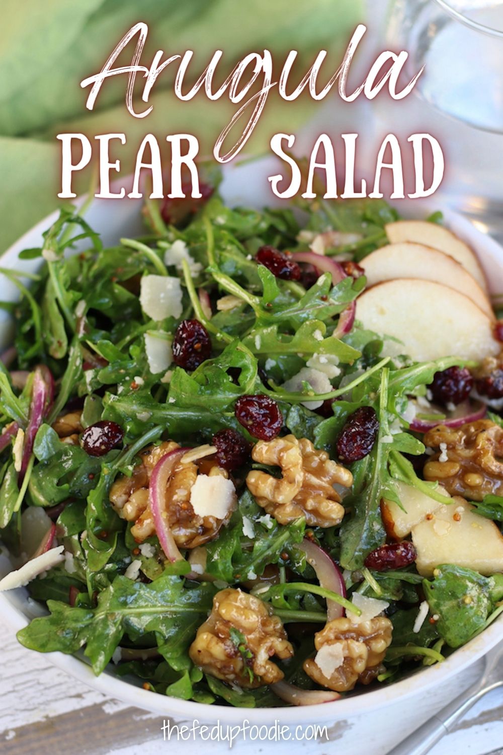 Savory and sweet, this Arugula Pear Salad is a simple and healthy recipe. Perfect as a side dish or light meal with arugula, pear, honey glazed walnuts, parmesan and a balsamic vinaigrette. So delicious and easy, this is sure to become a Fall favorite.  #RocketSaladRecipe #RocketSalad #ArugulaSalad #EasySalads #FallSalads #InterestingSalads #LeafySaladRecipes