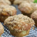 Moist Apple Spice Muffins sitting on a cooling rack.
