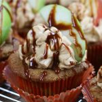 Up close photo of Caramel Apple Cupcakes with a caramel drizzle.