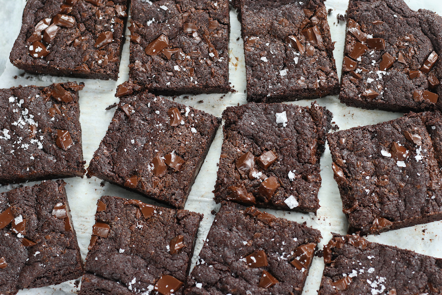 Brownies with big chunks of chocolate from Chewiest Brownie Recipe sprinkled with flakey sea salt.