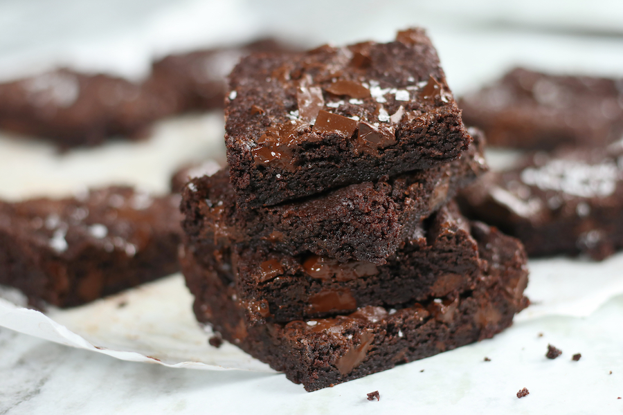 A stack of 4 brownies from Chewy Fudgy Brownie Recipe.
