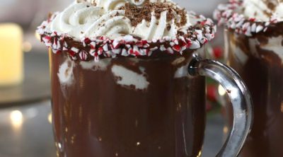 Gourmet Hot Cocoa in a clear glass mug.